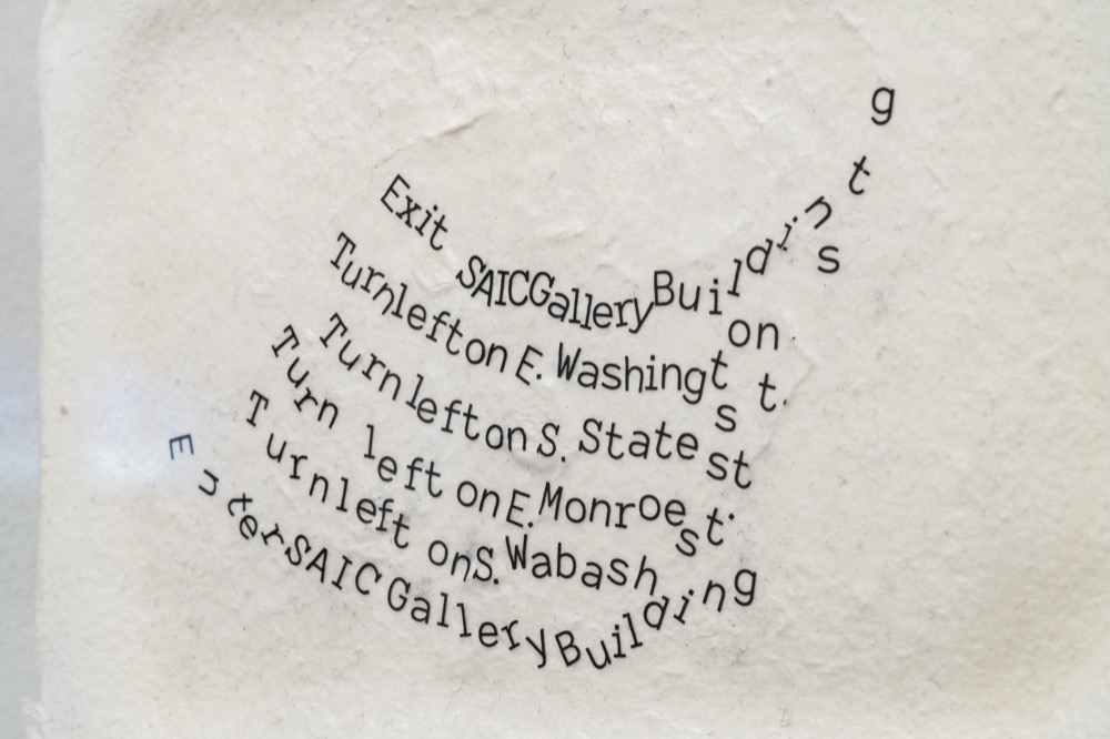 Artifact: the same directions, the paper dissolved and the text curved