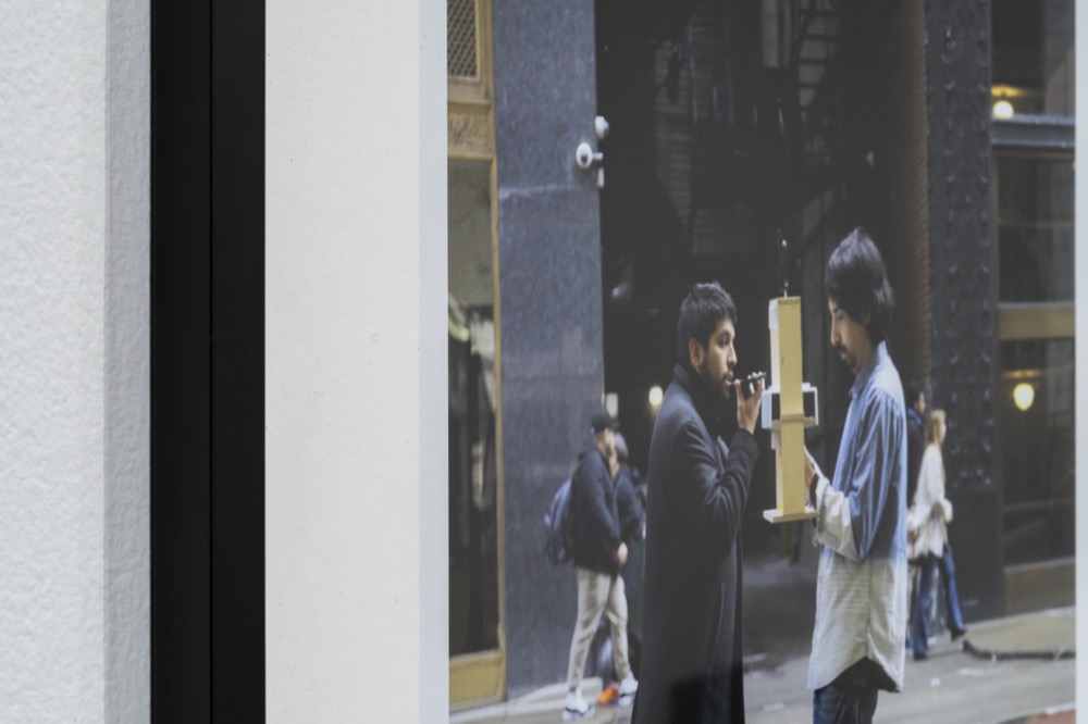 Detail of the photograph of two people walking